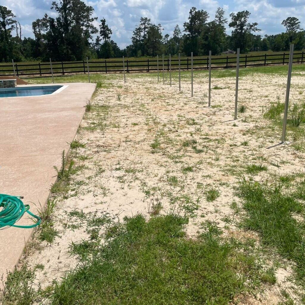 Patchy yard by pool before AI visualization